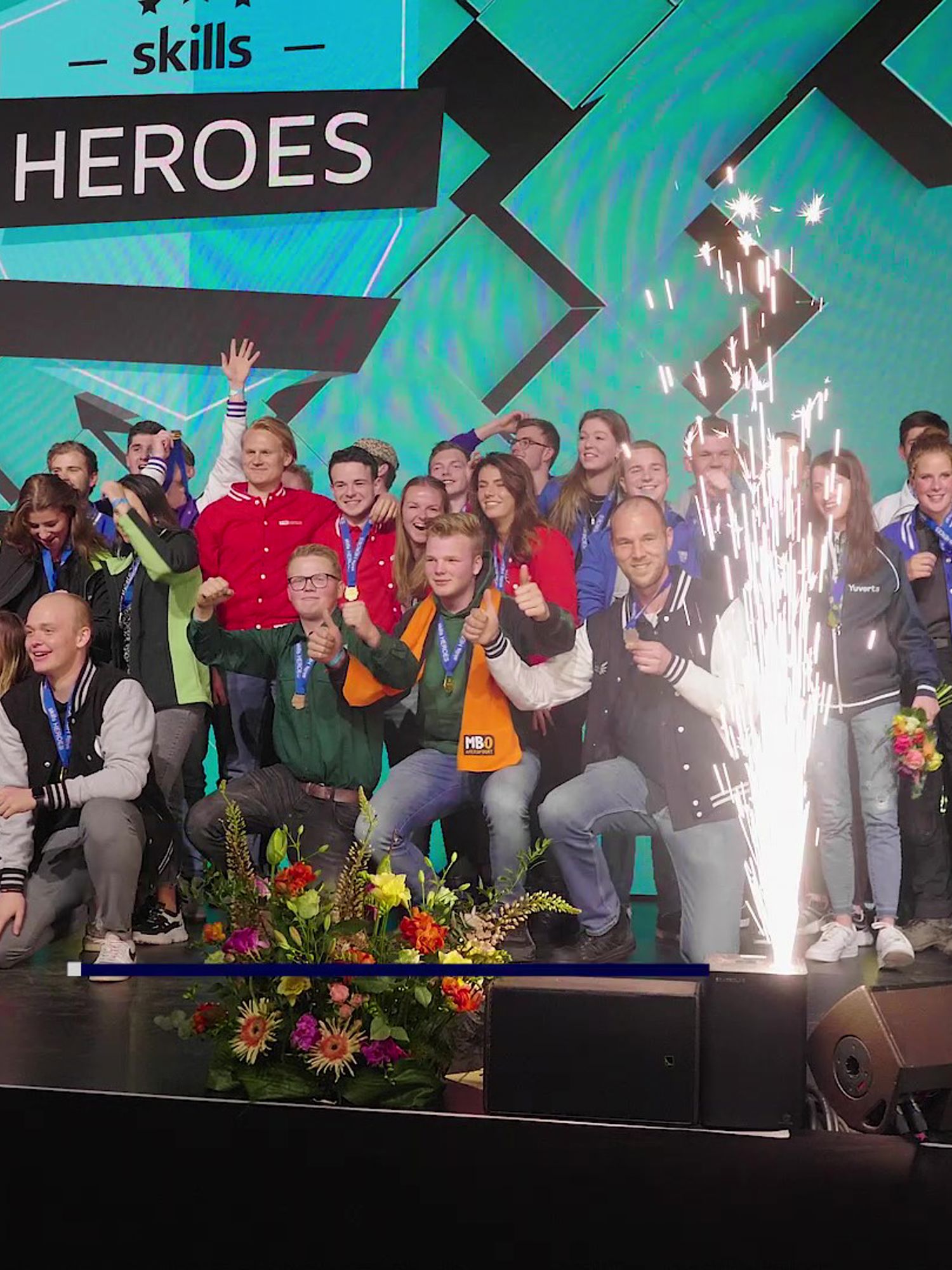 Mbo-studenten op het podium tijdens Skills The Finals 2025